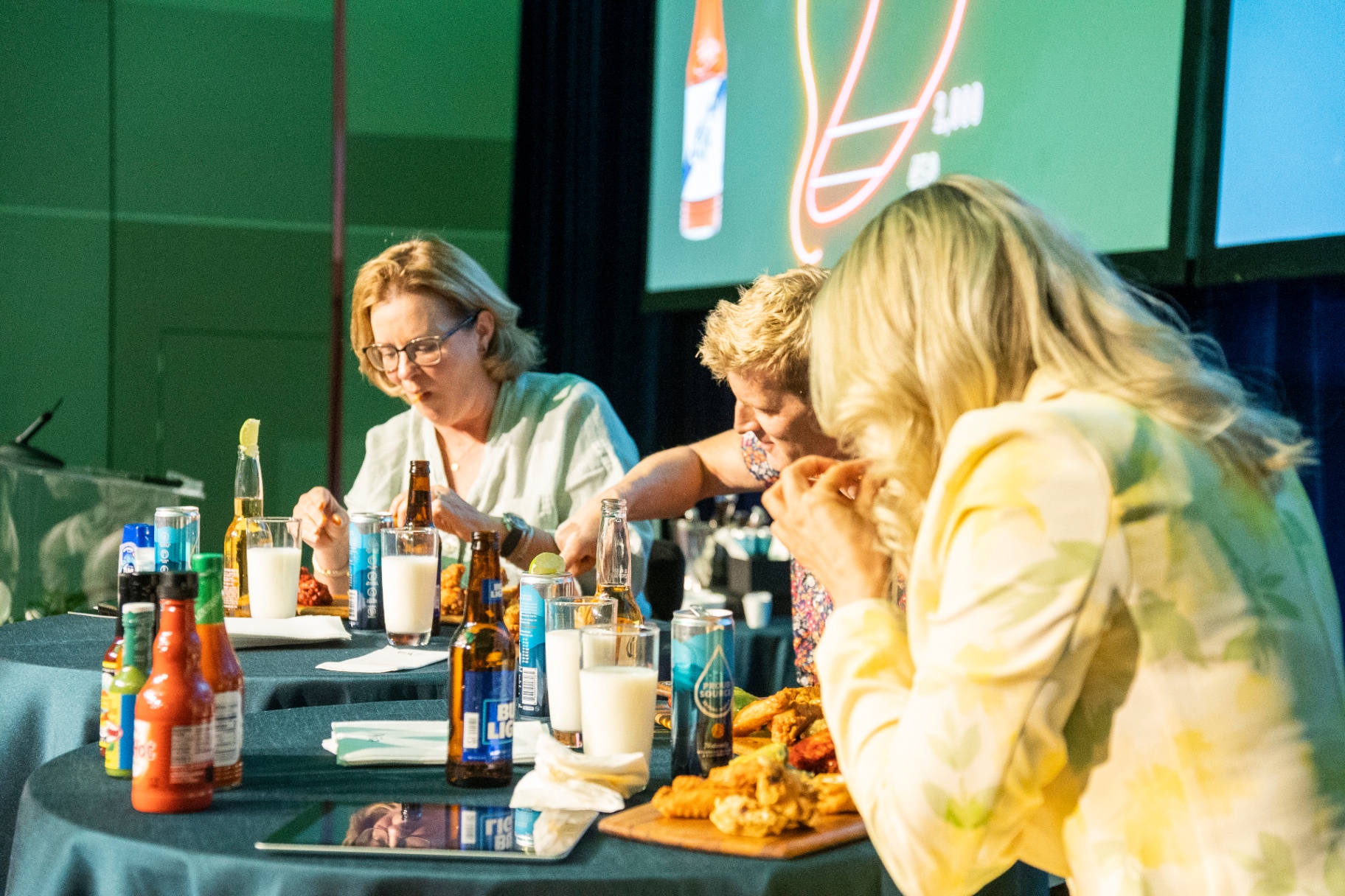Chloe hosting a tasting challenge segment at ELX